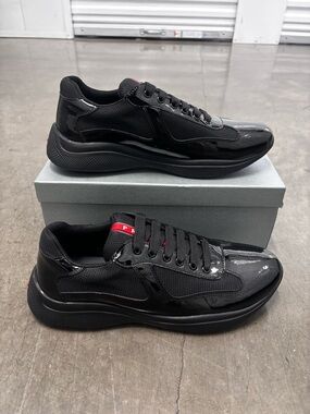Prada Black Low-Top Sneakers with Red Tab